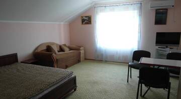 Фото номера Классический четырёхместный номер Гостиница Guest House On Sirennaya г. Феодосия 3