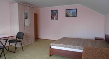 Фото номера Классический четырёхместный номер Гостиница Guest House On Sirennaya г. Феодосия 4