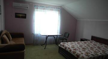 Фото номера Классический четырёхместный номер Гостиница Guest House On Sirennaya г. Феодосия 6