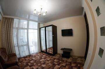 Фото номера Апартаменты - 1-й этаж Апартаменты Rooms on Chernomorskaya Naberezhnaya г. Феодосия 31
