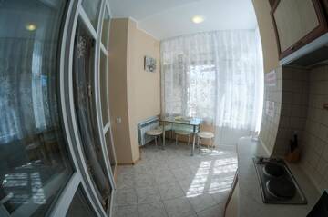 Фото номера Апартаменты - 1-й этаж Апартаменты Rooms on Chernomorskaya Naberezhnaya г. Феодосия 41
