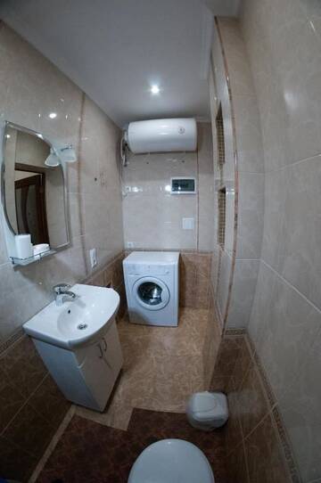 Фото номера Апартаменты - 1-й этаж Апартаменты Rooms on Chernomorskaya Naberezhnaya г. Феодосия 35