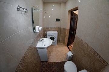 Фото номера Апартаменты - 1-й этаж Апартаменты Rooms on Chernomorskaya Naberezhnaya г. Феодосия 42