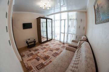 Фото номера Апартаменты - 1-й этаж Апартаменты Rooms on Chernomorskaya Naberezhnaya г. Феодосия 37