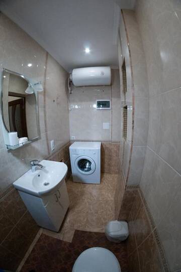 Фото номера Апартаменты - 1-й этаж Апартаменты Rooms on Chernomorskaya Naberezhnaya г. Феодосия 8