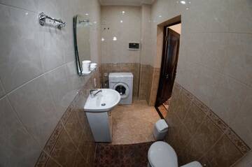 Фото номера Апартаменты - 1-й этаж Апартаменты Rooms on Chernomorskaya Naberezhnaya г. Феодосия 21