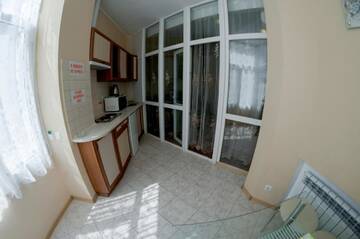 Фото номера Апартаменты - 1-й этаж Апартаменты Rooms on Chernomorskaya Naberezhnaya г. Феодосия 19