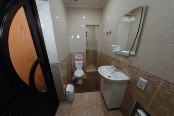 Фото номера Апартаменты - 1-й этаж Апартаменты Rooms on Chernomorskaya Naberezhnaya г. Феодосия 22