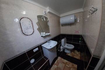 Фото номера Стандартные апартаменты Апартаменты Rooms on Chernomorskaya Naberezhnaya г. Феодосия 7