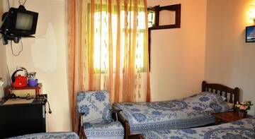 Фото номера Трехместный номер -люкс Гостиница Natali Guest House г. Феодосия 2