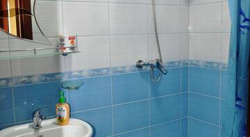 Фото номера Трехместный номер -люкс Гостиница Natali Guest House г. Феодосия 4