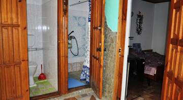 Фото номера Улучшенный четырехместный номер Гостиница Natali Guest House г. Феодосия 4