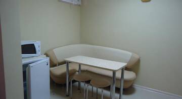 Фото номера Улучшенный четырехместный номер Гостиница Guest House Tamara г. Феодосия 4