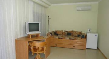 Фото номера Классический четырёхместный номер Гостиница Guest House Tamara г. Феодосия 3