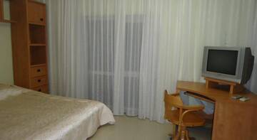 Фото номера Классический четырёхместный номер Гостиница Guest House Tamara г. Феодосия 2