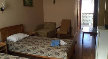 Фото номера Двухместный номер с 2 отдельными кроватями Гостевой дом Villa Vita г. Феодосия 7