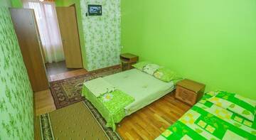 Фото номера Трехместный номер  Гостиница Гостевой Дом Ча-Ча г. Феодосия 7