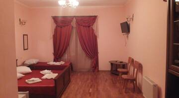 Фото номера Трехместный номер-люкс Гостиница Афродита г. Феодосия 4