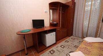 Фото номера Улучшенный четырехместный номер Гостиница Guest House Svetoch г. Феодосия 6