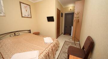 Фото номера Стандартный двухместный номер с 1 кроватью Гостиница Guest House Svetoch г. Феодосия 4