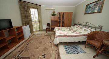 Фото номера Четырехместный номер  Гостиница Guest House Svetoch г. Феодосия 5