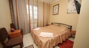 Фото номера Стандартный двухместный номер с 1 кроватью Гостиница Guest House Svetoch г. Феодосия 2