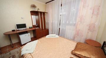 Фото номера Стандартный четырехместный номер Гостиница Guest House Svetoch г. Феодосия 2