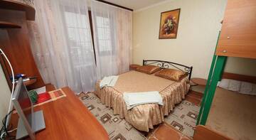 Фото номера Стандартный четырехместный номер Гостиница Guest House Svetoch г. Феодосия 5