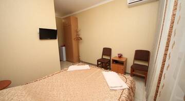 Фото номера Стандартный двухместный номер с 1 кроватью Гостиница Guest House Svetoch г. Феодосия 5