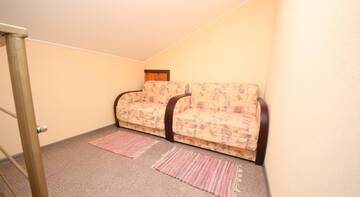 Фото номера Улучшенный четырехместный номер Гостиница Guest House Svetoch г. Феодосия 7