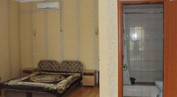 Фото номера Четырехместный номер  Гостиница Guest House Mechta г. Феодосия 2