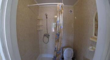 Фото номера Cемейный номер с отдельной ванной комнатой Гостиница Guest House Loza г. Феодосия 5