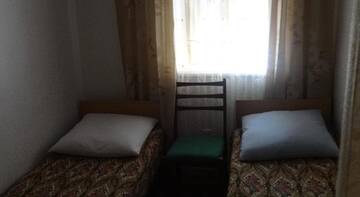 Фото номера Двухместный номер с 2 отдельными кроватями и общим туалетом Гостевой дом Otdikh na 1 Maya г. Феодосия 4